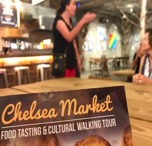 Tour Guide telling a story at Chelsea market